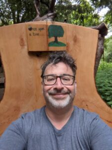 Rod in wooden chair at RHS Bridgewater