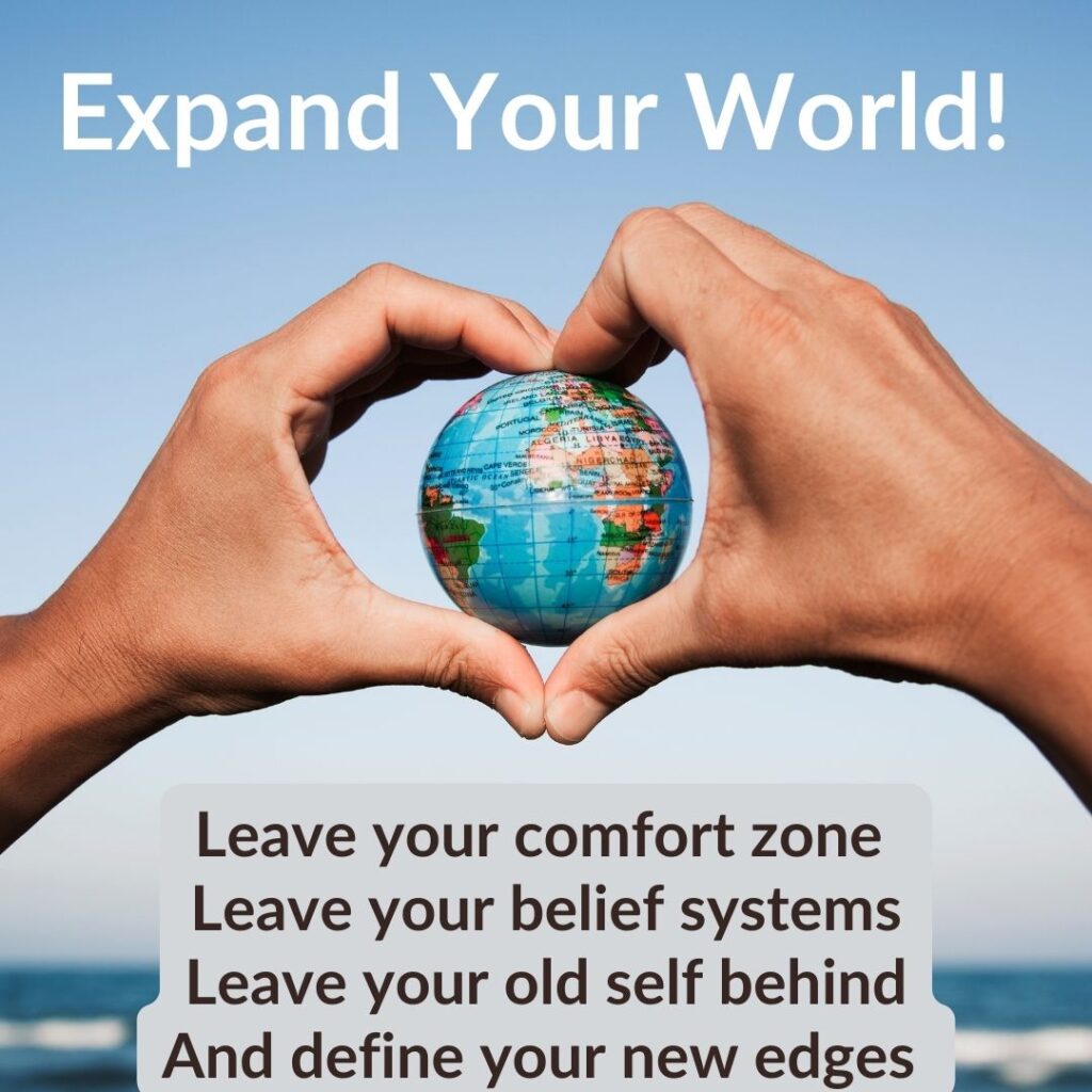 expand your world held in hand love sign personal development and success