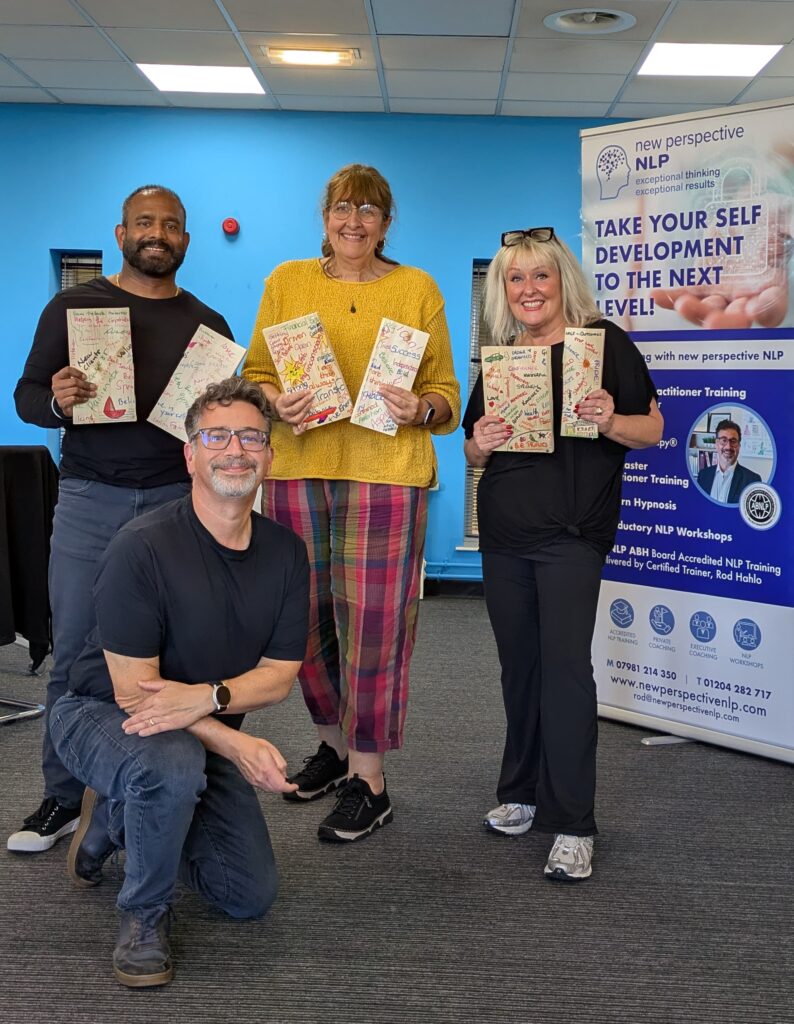 Group of students and Rod having mastery of board break