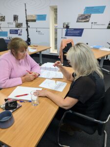 Hypnotherapy students learning to use pendulum