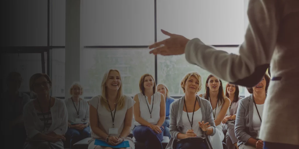 Expert speaker or trainer with audience