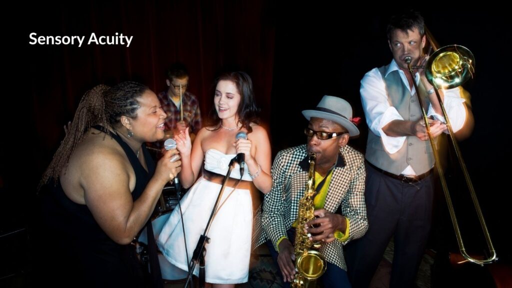 Jazz band musicians playing with sensory acuity keeping eyes on each other