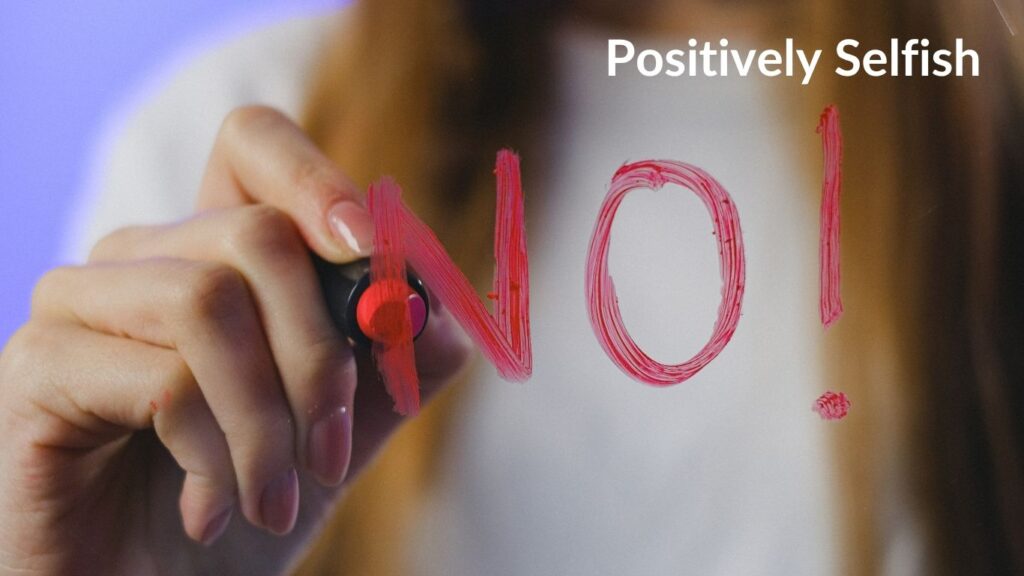 Female writing no in lipstick on mirror